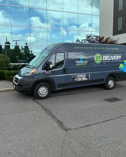 Trius delivery van at office building